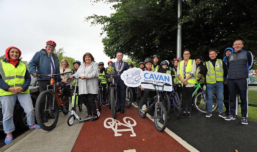 Eoin Doyle, Chief Executive Cavan County Council, Cllr Patricia Walsh, Vice-Chair Cavan/Belturbet Municipal District and Cathaoirleach John Paul Feeley alongside staff of Cavan County Council & Cavan Sports Partnership with the children from St Felim's National School, Cavan Town as they prepare to start their Scoot to School on Friday morning. The route took the students from Cavan Institute to St. Felim’s School, via the new cycling lanes and upgraded footpaths installed by Cavan County Council-2 Eoin Doyle, Chief Executive Cavan County Council, Cllr Patricia Walsh, Vice-Chair Cavan/Belturbet Municipal District and Cathaoirleach John Paul Feeley alongside staff of Cavan County Council & Cavan Sports Partnership with the children from St Felim's National School, Cavan Town as they prepare to start their Scoot to School on Friday morning. The route took the students from Cavan Institute to St. Felim’s School, via the new cycling lanes and upgraded footpaths installed by Cavan County Council