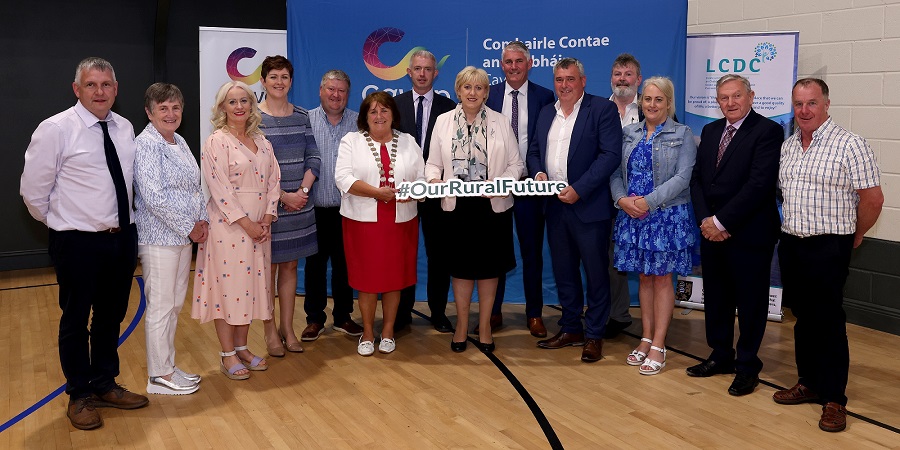 Pictured at the announcement of €268,600 for 87 Cavan projects under Community Support Fund by Minister Heather Humphreys in Killinkere on Thursday evening are (from left) Cllr Trevor Smith; Cllr Madeleine Argue; Niamh Smyth TD; Pauline Tully TD; Cllr Shane P O’Reilly; Leas-Chathaoirleach of Cavan County Council, Cllr Patricia Walsh, Brendan Jennings, Acting Chief Executive, Cavan County Council and Chair, Cavan LCDC; Minister for Rural and Community Development, Heather Humphreys TD; Cllr Aiden Fitzpatrick; Cllr TP O’Reilly; Cllr Brendan Fay; Cllr Sarah O’Reilly; Cllr Clifford Kelly; Cllr Val Smith. PHOTO: Adrian Donohoe.